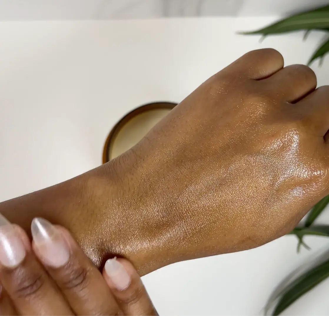 Moisturised hand after applying motherland organics unrefined shea butter — smooth, nourished skin with a natural glow. Rich in pure, organic shea butter, ideal for dry skin, eczema relief, and daily hydration.