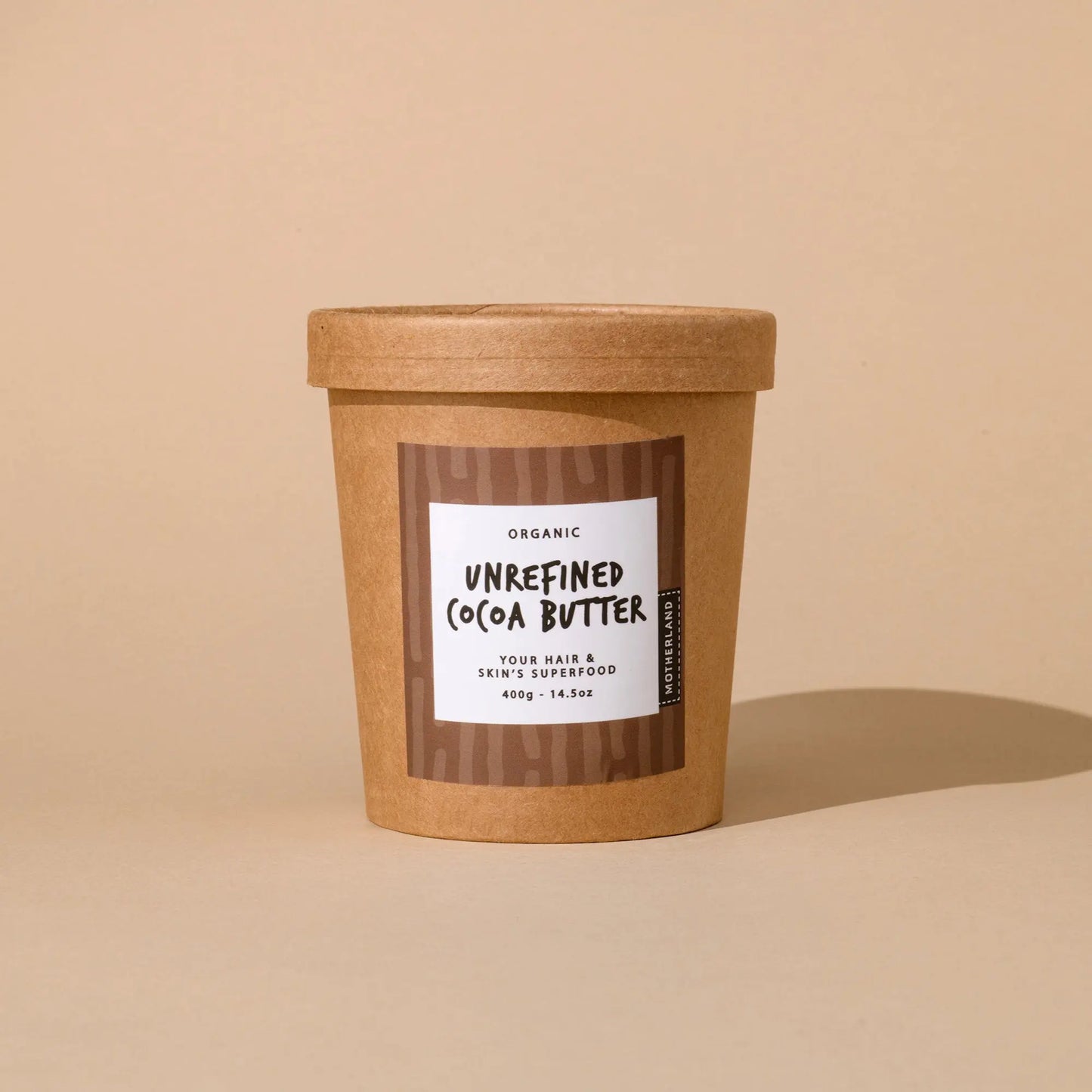 Motherland Organics 400g tub of organic unrefined cocoa butter. Raw cacao butter moisturiser for skin, face, and hair. Ideal for cooking, DIY skincare, and making cocoa butter lotion, cream, or hand balm. 100% natural and food-grade.
