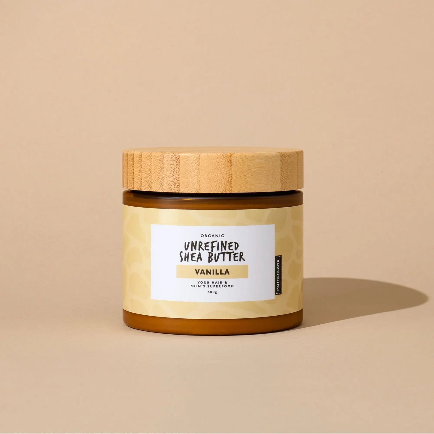 Motherland Organics Vanilla Unrefined Shea Butter – 400g of pure, raw, organic shea butter infused with natural vanilla for nourishing dry skin, softening hair, and soothing eczema with a rich, moisturising formula.