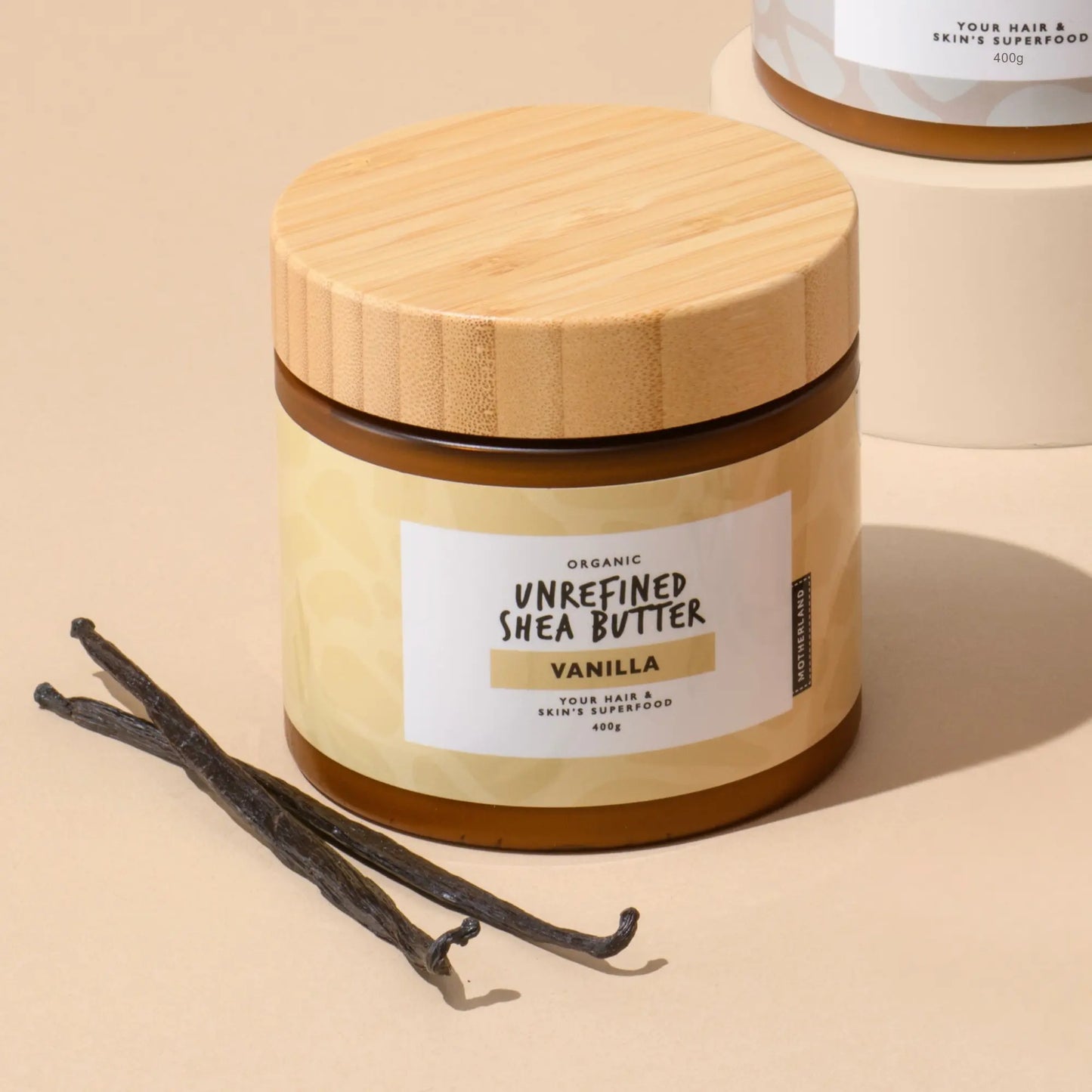 Vanilla-infused organic unrefined shea butter in eco-friendly jar. Best natural moisturiser for dry skin, face, and body. Softens, nourishes, and soothes sensitive skin with a subtle vanilla scent. Ideal for daily skin care.